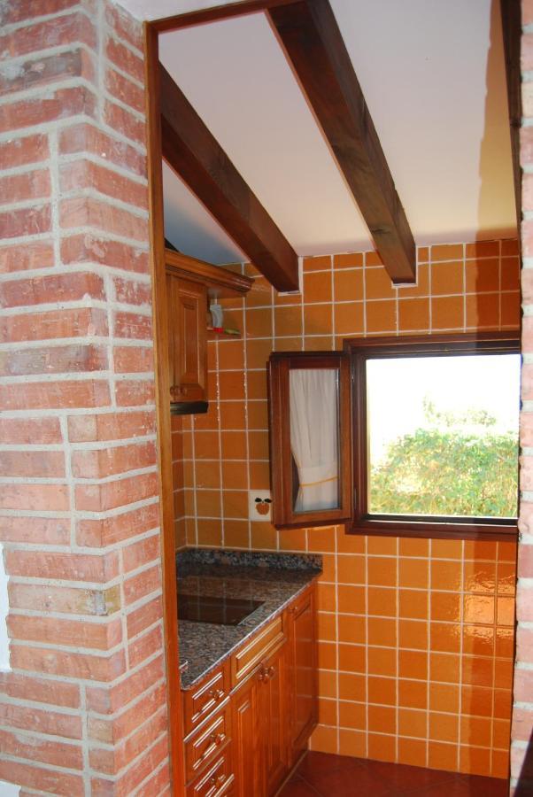 Apartamentos El Perujo 코밀라스 외부 사진